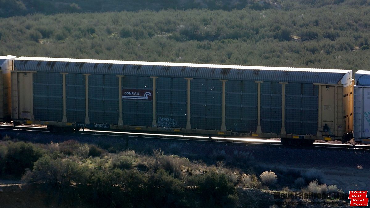 ETTX 909628
Hill 582, Cajon Pass

Conrail yellow rack with brown logo panel
